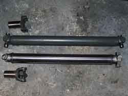 [Old (top) vs. New (bottom) Shorter Drive Shaft; Click to See a Larger Image]